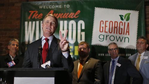 Jan. 10, 2016 - Atlanta - U.S. Sen. David Perdue addresses the supper crowd. The 54th Annual Wild Hog Supper, benefitting the Georgia Food Bank Association, was held at the Georgia Railroad Depot Sunday evening. The "Wild Hog Supper," a Georgia tradition dating back to 1962, marks the opening of the legislative session each year. BOB ANDRES / BANDRES@AJC.COM