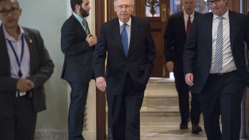 Like Senate Majority Leader Mitch McConnell on Thursday night, tax reform marches on in Congress. (AP Photo / J. Scott Applewhite)