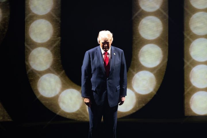 Former president Donald Trump walks onto the stage to accept the Republican presidential nomination at Fiserv Form in Milwaukee on Thursday, July 18, 2024, the fourth day of the Republican National Convention (Arvin Temkar / AJC)