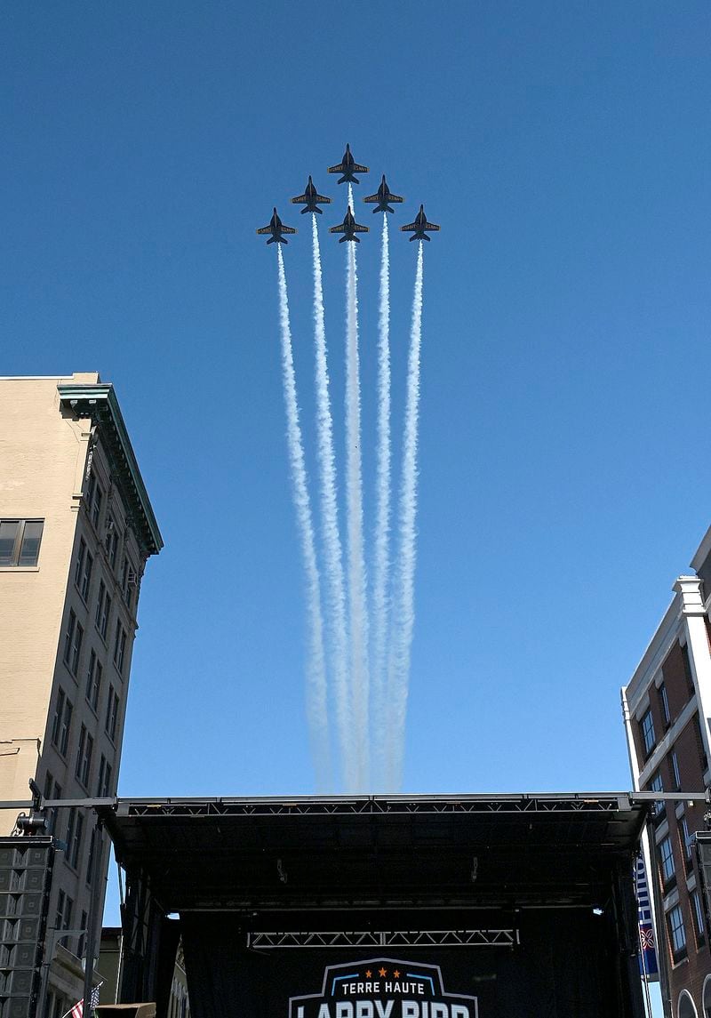Members of the U.S. Navy Blue Angels fly over downtown Terre Haute, Ind., before the grand opening ceremony for the Larry Bird Museum, Thursday, May 30, 2024, in Terre Haute, Ind. (Joseph C. Garza/The Tribune-Star via AP)
