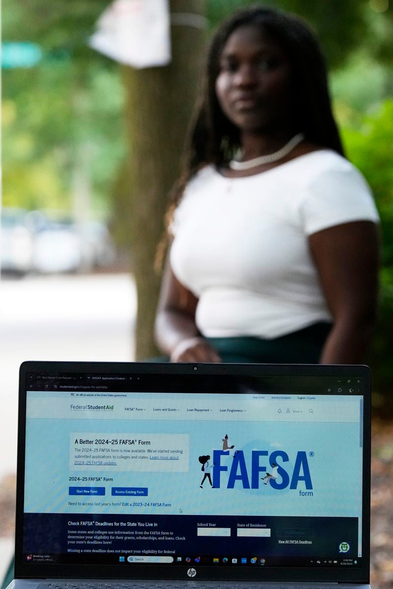 FAFSA website is seen on Adjovi Golo's laptop at DePaul University in Chicago, Wednesday, Aug. 28, 2024. (AP Photo/Nam Y. Huh)