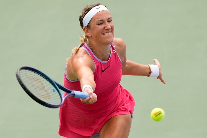 Victoria Azarenka, of Belarus, returns a shot to Wang Yafan, of China, during the third round of the U.S. Open tennis championships, Friday, Aug. 30, 2024, in New York. (AP Photo/Kirsty Wigglesworth)