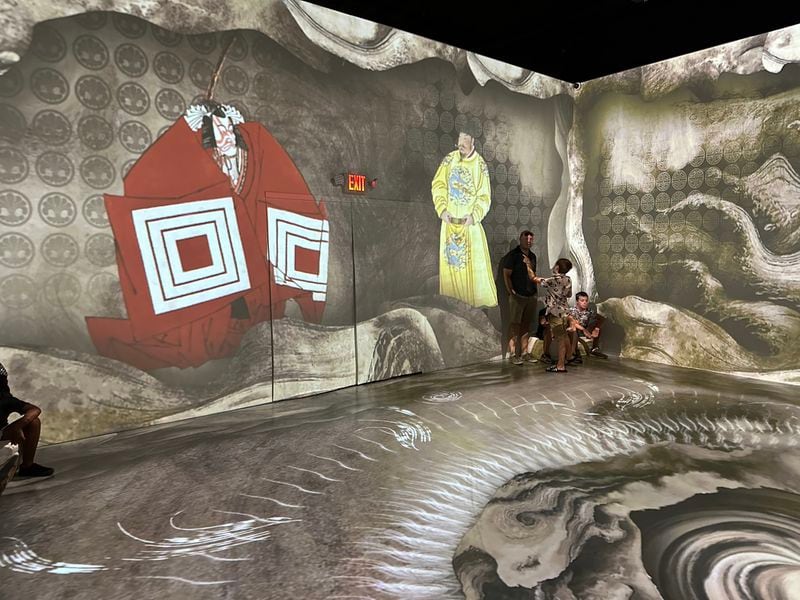 One immersive room at the Van Gogh exhibit at Exhibition Hub Art Center in Doraville features Japanese art's influence on Van Gogh himself. RODNEY HO/rho@ajc.com