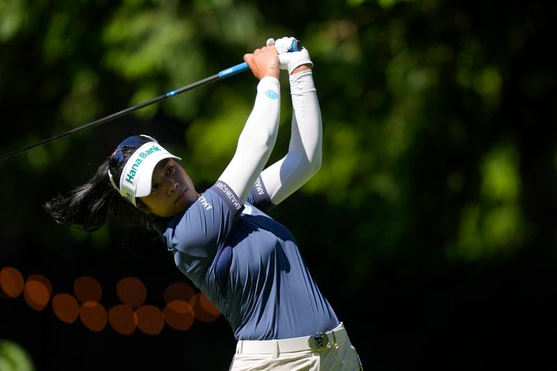 Patty Tavatanakit, of Thailand, watches her shot from the 12th tee during the first round of the Women's PGA Championship golf tournament at Sahalee Country Club, Thursday, June 20, 2024, in Sammamish, Wash. (AP Photo/Gerald Herbert)