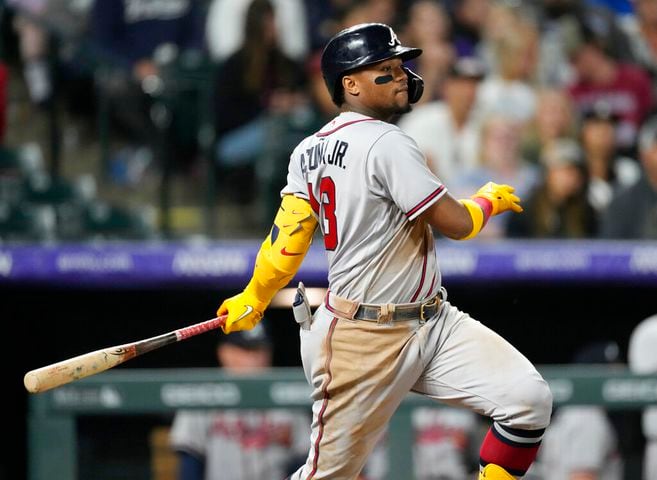 Travis d'Arnaud's 2 homers, 6 RBIs lead Braves over Rockies