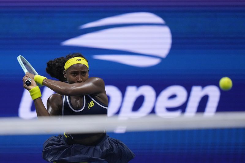 Coco Gauff, of the United States, returns a shot to Tatjana Maria, of Germany, during a second round match of the U.S. Open tennis championships, Wednesday, Aug. 28, 2024, in New York. (AP Photo/Frank Franklin II)