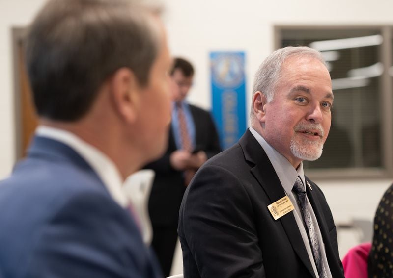 State School Superintendent Richard Woods (right) during a 2022 roundtable.