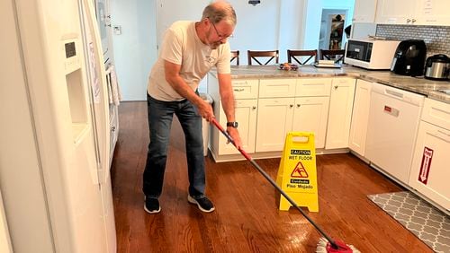 Bernie Murphy's volunteer time at the Atlanta Hospital Hospitality House includes greeting guests, cooking dinner and handling household chores. Courtesy