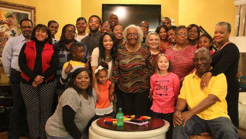 A Thanksgiving 2016 photo of AJC Senior Editor Mike Jordan's family, taken inside the home of his late mother, Constance Wilson (far right).