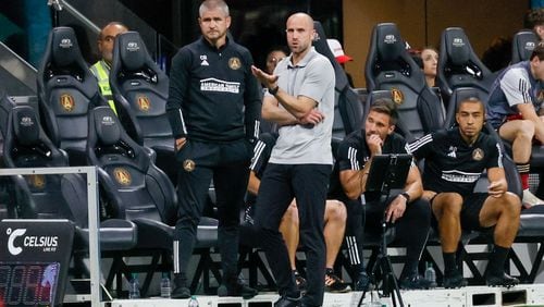 Atlanta United interim manager Rob Valentino watches the action during stoppage time against New York City at Mercedes-Benz Stadium on Wednesday, July 17, 2024. 
(Miguel Martinez/ AJC)