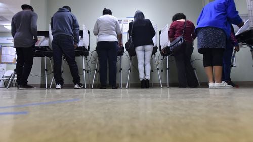 Gwinnett County residents cast their votes in 2016’s presidential election at Amazing Grace Lutheran Church in Lawrenceville. HYOSUB SHIN / HSHIN@AJC.COM