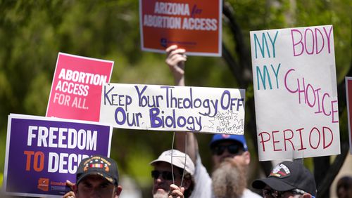 FILE - Abortion rights supporters gather outside the Capitol, Wednesday, April 17, 2024, in Phoenix. (AP Photo/Matt York, File)