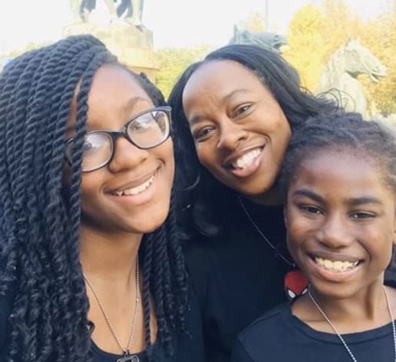 DaVina Jackson (center), with her daughter, JeNaii (left), and son, JeKaii, have been living in China since last summer, where DaVina began teaching English to pre-school children. Now they are struggling to get back home because of the coronoavirus scare. CONTRIBUTED: DAVINA JACKSON
