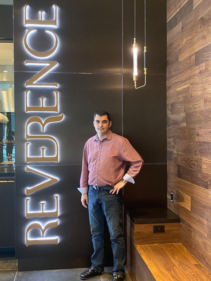 Rather than a traditional lobby, guests step inside Epicurean’s flagship restaurant, Reverence, featuring a new American menu  developed by the hotel’s executive chef, Ewart Wardhaugh. Ligaya Figueras/ligaya.figueras@ajc.com