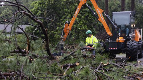 Clean-up crews working to clear storm debris, including pine trees, in a neighborhood on the north side of Valdosta, Georgia after  Hurricane Debby made landfall in Florida before being downgraded to a tropical storm on Monday, August 5, 2024.
(Miguel Martinez / AJC)