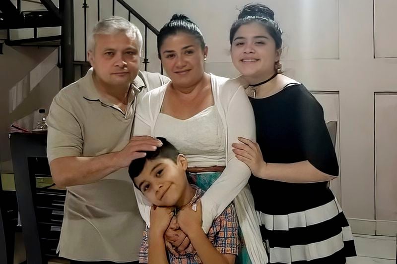 In this June 2020 photo, Xavier Chavarría, left, poses for a photo with his wife Karen Chavarría, center, and their children Karen Azriela Chavarria, right, and son Xavier Yahir Chavarría, in Jinotega, Nicaragua. (Courtesy Xavier Chavarría via AP)