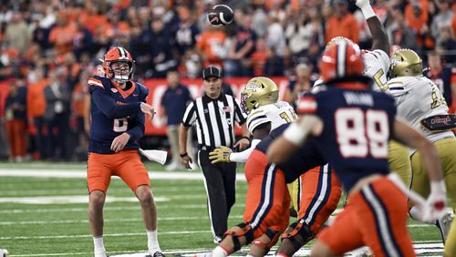 Syracuse quarterback Kyle McCord (6) throws a passduring the first half of an NCAA football game against Georgia Tech, Saturday, Sept. 7, 2024 in Syracuse, N.Y. (AP Photo/Hans Pennink)