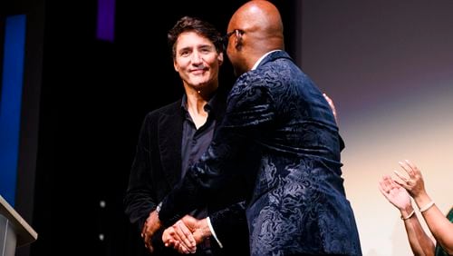 Canada Prime Minister Justin Trudeau greets CEO of the Toronto International Film Festival Cameron Bailey, before the premiere of “Nutcrackers” at Roy Thomson Hall during the Toronto International Film Festival, Thursday, Sept. 5, 2024, in Toronto. (Cole Burston/The Canadian Press via AP)