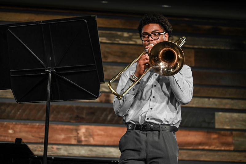 Spencer Branch received a full tuition scholarship to attend Hampton University after participating in Atlanta Music Project's music education program for much of his childhood.