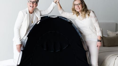 Lou Childs and Katy Mallory with a SlumberPod, a sleep enclosure for babies and small children. Contributed by Lou Childs