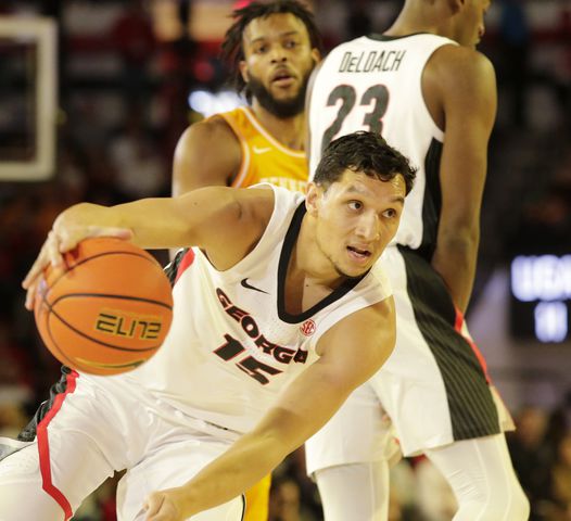 University of Georgia’s RJ Melendez (15)  takes the ball through the Tennessee Vols  in first-half action at Stegemen in Athens Saturday, January 13, 2024.
Nell Carroll for the AJC