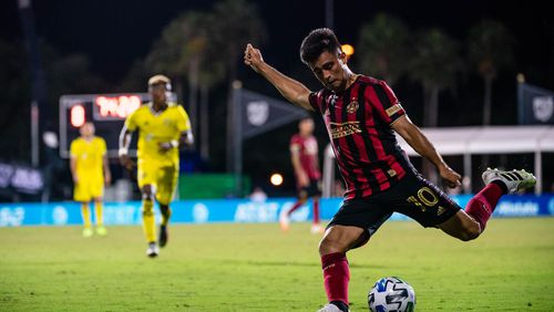 Pity Martinez (10) takes as shot as Atlanta United was eliminated from the MLS is Back tournament with a 1-0 loss to Columbus Tuesday, July 21, 2020, in Orlando, Fla.