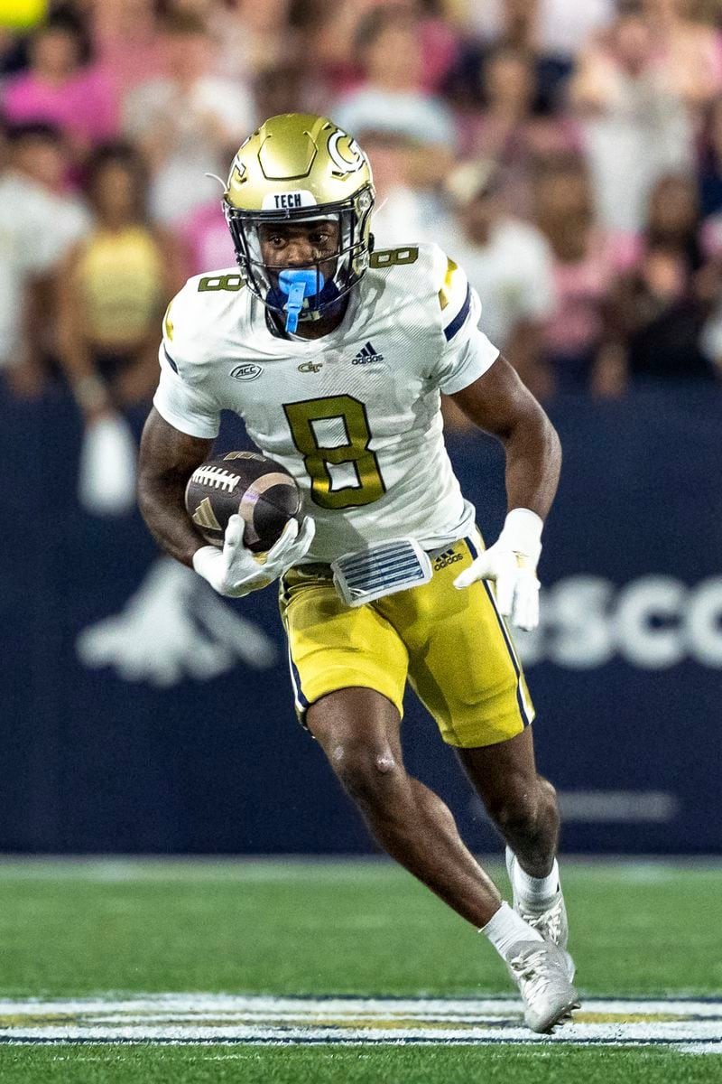 Georgia Tech Yellow Jackets wide receiver Malik Rutherford (8) runs the ball after a catch in the first quarter of a football game against the Duke BlueDevils, Saturday, Oct. 5, 2024, in Atlanta. (AP Photo/Jason Allen)