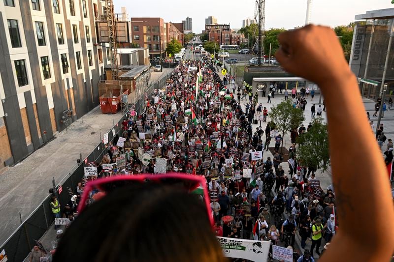 Protesters march during a demonstration outside the Democratic National Convention Wednesday, Aug. 21, 2024, in Chicago. (AP Photo/Noah Berger)