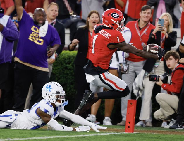  Georgia Bulldogs wide receiver Marcus Rosemy-Jacksaint (1) scores Georgia's first touchdown during the first half of an NCAA football game between Kentucky and Georgia in Athens on Saturday, Oct. 7, 2023.   (Bob Andres for the Atlanta Journal Constitution)