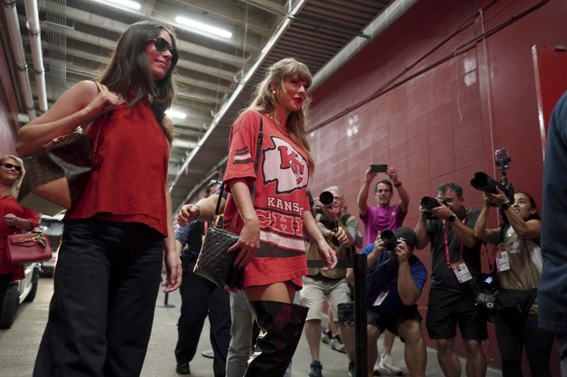 Taylor Swift arrives before the start of an NFL football game between the Kansas City Chiefs and the Cincinnati Bengals Sunday, Sept. 15, 2024, in Kansas City, Mo. (AP Photo/Charlie Riedel)