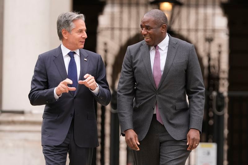 U.S. Secretary of State Antony Blinken, left, talks to Britain's Foreign Secretary David Lammy as he arrives for a meeting at the Foreign, Commonwealth and Development Office (FCDO) in London, Tuesday, Sept. 10, 2024. (AP Photo/Mark Schiefelbein, Pool)