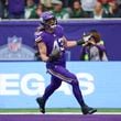 Minnesota Vikings' Andrew Van Ginkel celebrates as he scores after an interception during the first half of an NFL football game against the New York Jets, Sunday, Oct. 6, 2024, at the Tottenham Hotspur stadium in London. (AP Photo/Ian Walton)