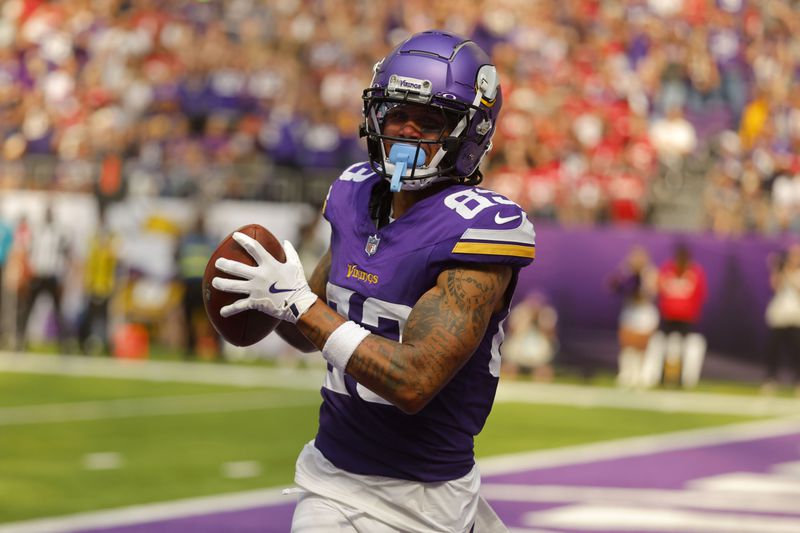 Minnesota Vikings wide receiver Jalen Nailor (83) catches a 10-yard touchdown pass during the second half of an NFL football game against the San Francisco 49ers, Sunday, Sept. 15, 2024, in Minneapolis. (AP Photo/Bruce Kluckhohn)