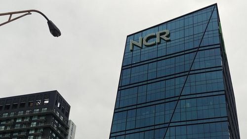 The NCR headquarters building in Midtown Atlanta next to the Downtown Connector in 20In 2023 the company split in two. On Tuesday, one of the successor companies sold its digital banking division. (Andy Peters/The Atlanta Journal-Constitution/TNS)