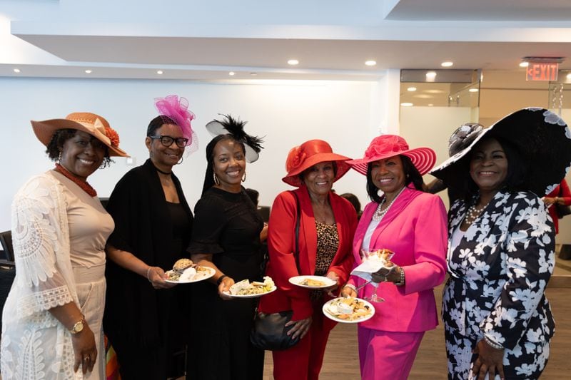 Women arrived wearing their finest hats for the May opening of the King Family Hat exhibition at the Alliance Theater, which was on display during the recent production of "The Preacher's Wife." Image credit: Alliance Theater.