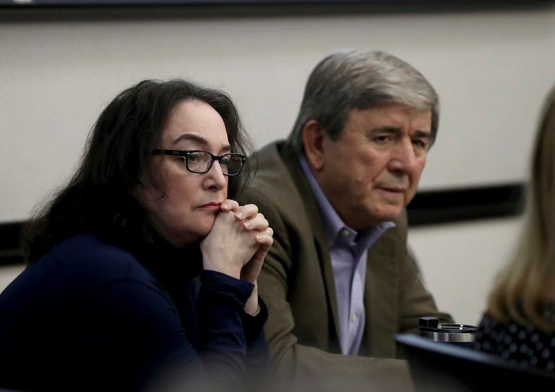 Rose Marie Kosmetatos, left, and her husband, Antonios Pagourtzis, parents of accused Santa Fe High School shooter Dimitrios Pagourtzis, listen to their attorneys discuss a motion Friday, Aug. 16, 2024, during their civil trial in Galveston County Court No. 3 Judge Jack Ewing's courtroom at the Galveston County Courthouse in Galveston, Texas. (Jennifer Reynolds/The Galveston County Daily News via AP, Pool)