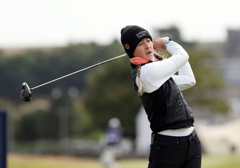 United States' Nelly Korda plays her tee shot from the 3rd tee during the first round of the Women's British Open golf championship, in St Andrews, Scotland Thursday, Aug. 22, 2024. (AP Photo/Scott Heppell)