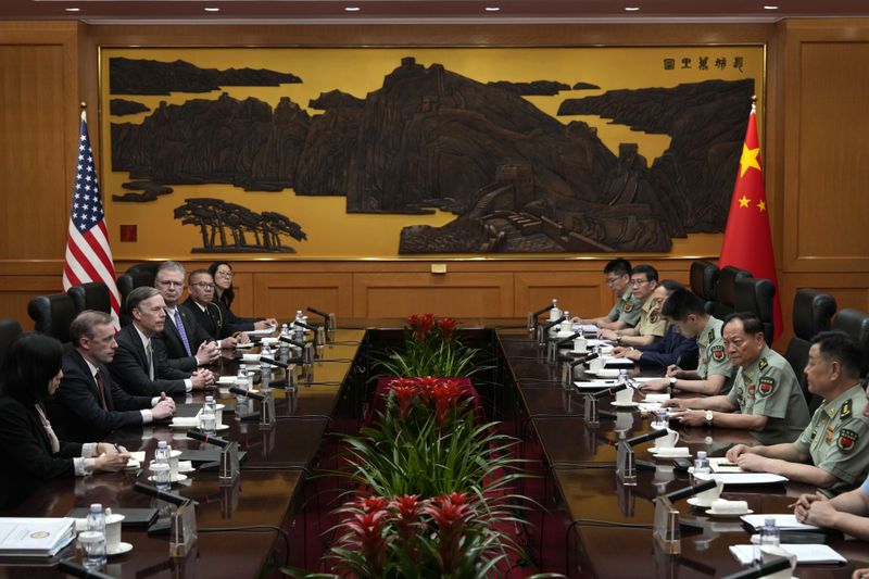 Zhang Youxia, Vice Chairman of the CPC Central Military Commission, second from right, holds a meeting with White House national security adviser Jake Sullivan, second from left. during a meeting at the Bayi building in Beijing, Thursday, Aug. 29, 2024. (AP Photo/Ng Han Guan, Pool)