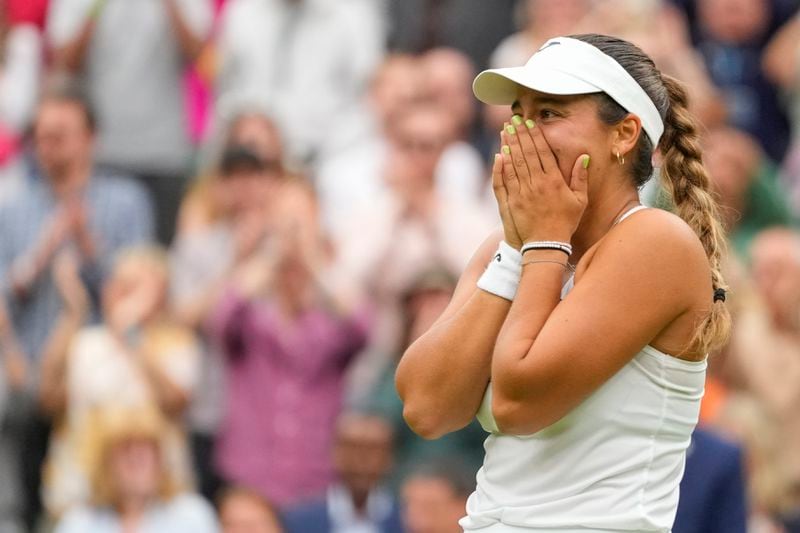 Jessica Bouzas Maneiro of Spain reacts after defeating Marketa Vondrousova of the Czech Republic during their first round match at the Wimbledon tennis championships in London, Tuesday, July 2, 2024. (AP Photo/Kirsty Wigglesworth)