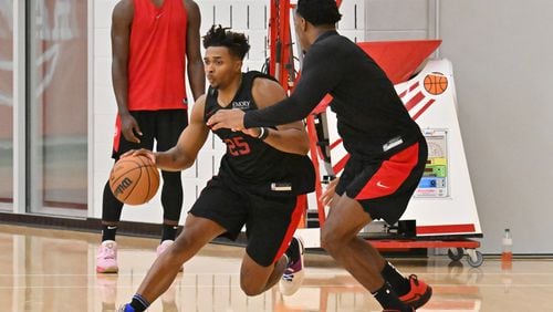 Hawks guard Tyson Etienne dribbles during practice Saturday in Atlanta. (Hyosub Shin / Hyosub.Shin@ajc.com)