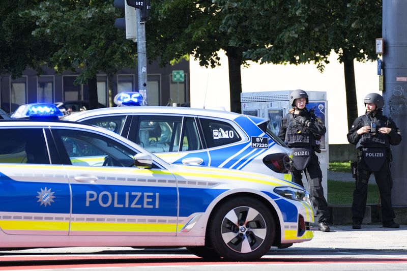 Police officer block a street after police fired shots at a suspicious person near the Israeli Consulate and a museum on the city's Nazi-era history in Munich, Germany, Thursday, Sept. 5, 2024. (AP Photo/Matthias Schrader)