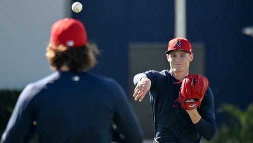 Atlanta Braves starting pitcher AJ Smith-Shawver throws during a spring training workout at CoolToday Park, Wednesday, Feb., 14, 2024, in North Port, Florida. (Hyosub Shin / Hyosub.Shin@ajc.com)