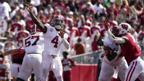 Georgia and Alabama line up at the line of scrimmage  during the second half in the SEC Championship game at Mercedes-Benz Stadium, December 2, 2023, in Atlanta. Alabama won 27-24 over Georgia. (Hyosub Shin / Hyosub.Shin@ajc.com)