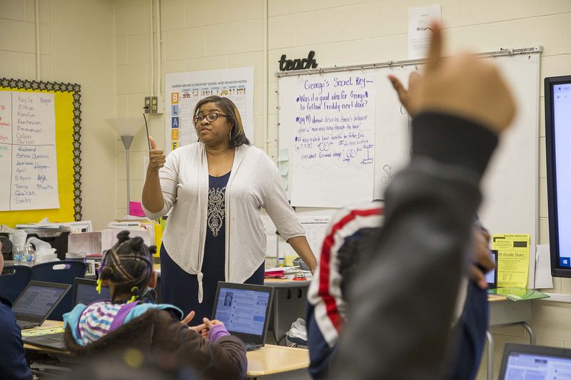Harper-Archer Elementary school fifth grade teacher Sheree Thomas goes over a practice Georgia Milestones Assessment prompt during class at Harper-Archer Elementary School in Atlanta, Wednesday, February 26, 2020. The Georgia Milestones Assessment System is a statewide test that evaluates fifth graders in the following subjects: English Language Arts, mathematics, science and social studies. (ALYSSA POINTER/ALYSSA.POINTER@AJC.COM)