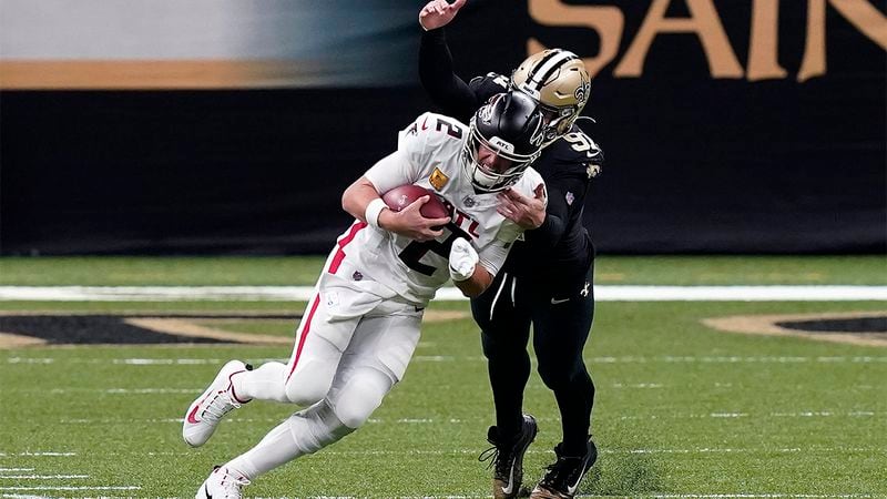 Saints defensive end Trey Hendrickson (91) sacks Falcons quarterback Matt Ryan (2) in the first half Sunday, Nov. 22, 2020, in New Orleans. (Butch Dill/AP)