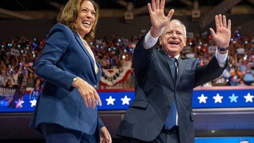 Vice President Kamala Harris and her running mate, Minnesota Gov. Tim Walz, campaign in Philadelphia on Tuesday.