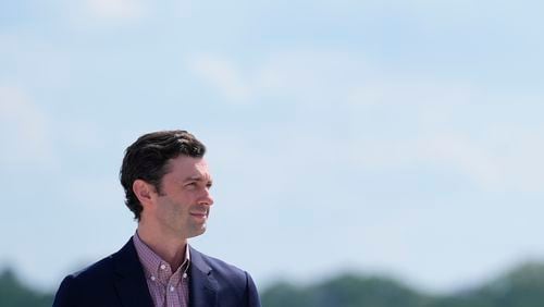 Sen. Jon Ossoff, D-Ga., waiting on the tarmac to greet Vice President Kamala Harris at Dobbins Air Reserve Base in Marietta, Ga. (AP Photo/Brynn Anderson)