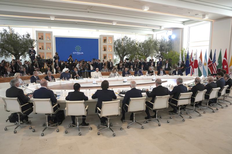 G7 world leaders and other leaders from guest nations attend a working session on Artificial Intelligence (AI), Energy, Africa-Mediterranean, on day two of the 50th G7 summit at Borgo Egnazia, southern Italy, on Friday, June 14, 2024. (Christopher Furlong/Pool Photo via AP)