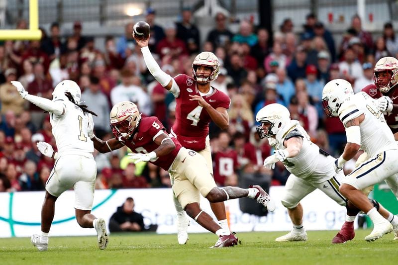 Florida's DJ Uiagalelei throws the ball during the NCAA college football game between Georgia Tech and Florida State at the Aviva stadium in Dublin, Saturday, Aug. 24, 2024. (AP Photo/Peter Morrison)