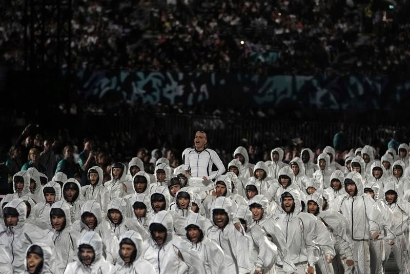 Artists perform during the Opening Ceremony for the 2024 Paralympics, Wednesday, Aug. 28, 2024, in Paris, France. (AP Photo/Thibault Camus, Pool)